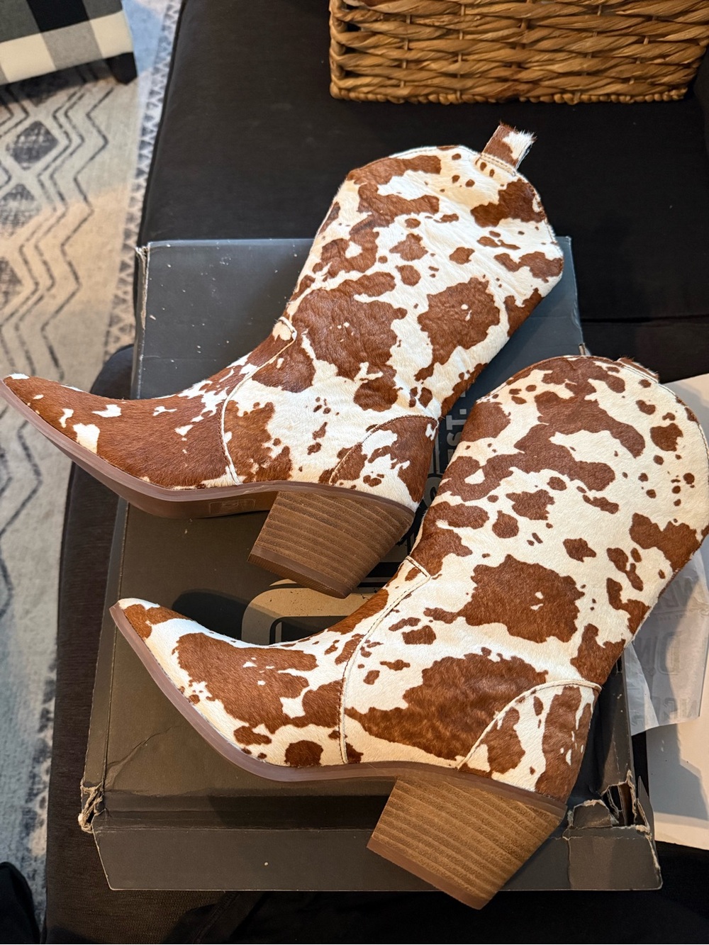 Cow print cowgirl boots